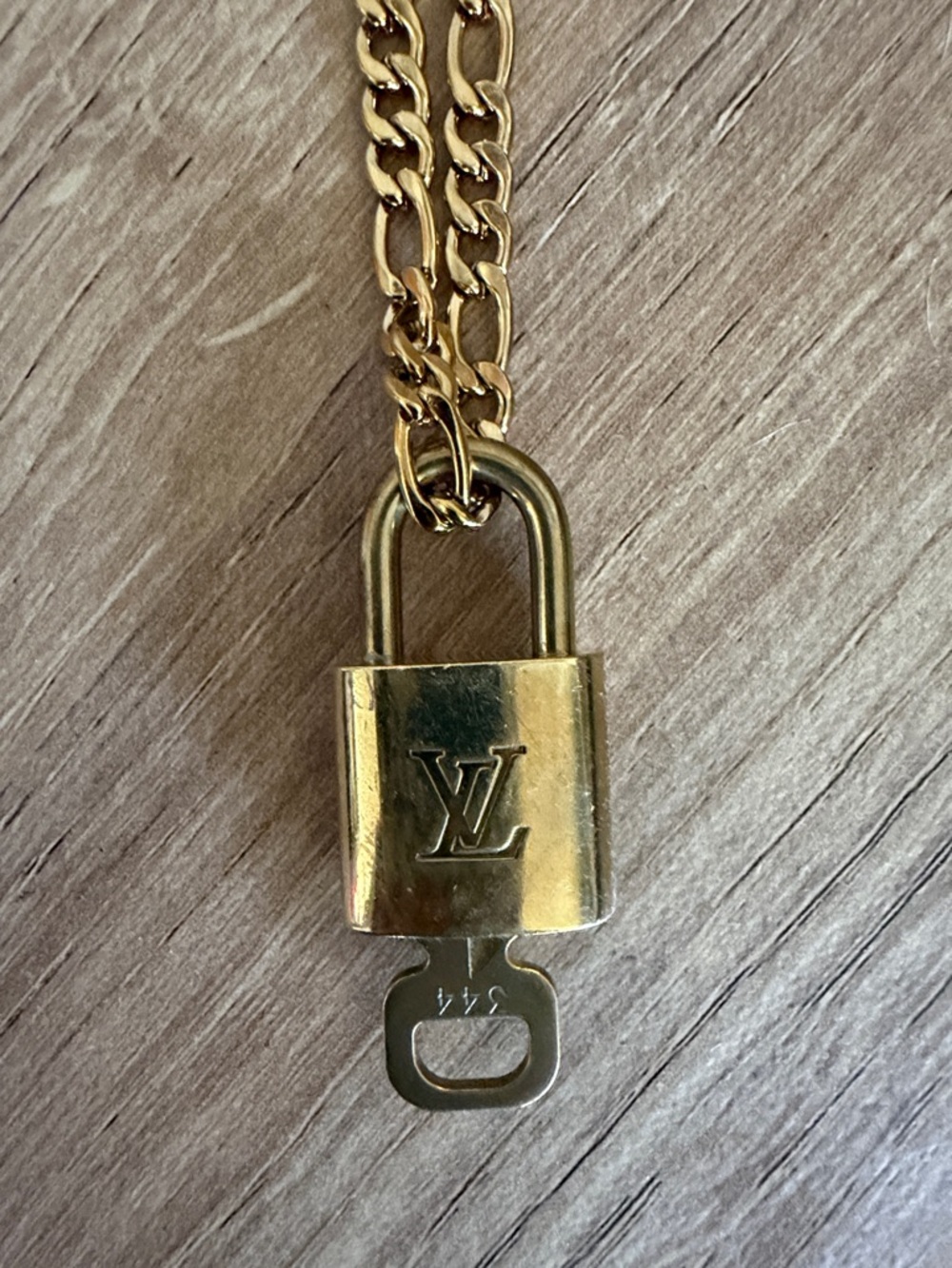 Louis Vuitton Gold-Tone Padlock Pendant with key and stainless steel necklace - Picture 3 of 3